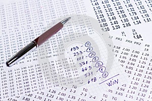 A note with the win selection of the winning codes on bookmakers