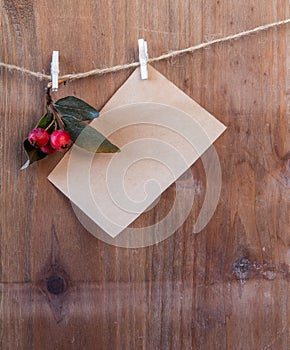 Note and winter berries on a rope