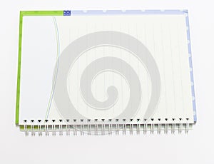 Notebook background view with a spiral binding