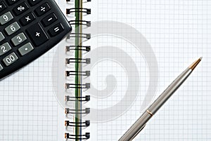 Notebook, ballpen and calculator