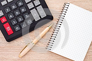 Notebook, ballpen and calculator