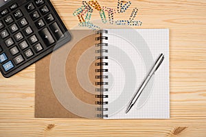 Notebook, ballpen and calculator