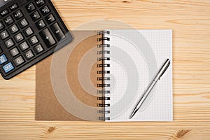 Notebook, ballpen and calculator