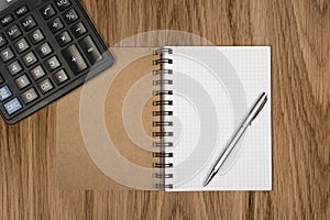 Notebook, ballpen and calculator