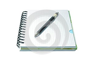 Notebook and black mecanical pencil isolated on wh