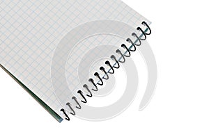 Notebook with checkered sheets and spring binding.