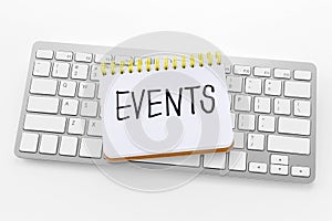 Notebook with events word on keyboard