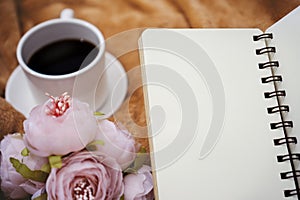 Notebook, Flower and Coffee Cup on Blanket
