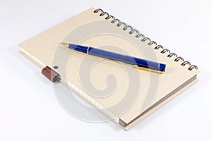 Notebook with a fountain pen.