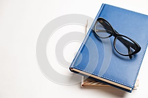 Notebook with glasses and pen, Book with glasses, Blue notebook