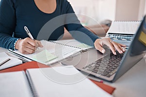 Notebook, laptop and writing hands of black woman or accounting financial consultant in home office working online