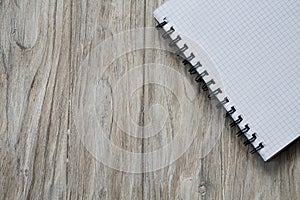 Notebook on ligt wooden background