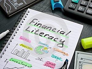 A Notebook with marks about financial literacy.