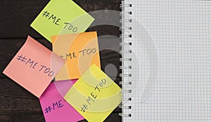 Notebook and Me Too hashtag on a adhesive note posted mock up