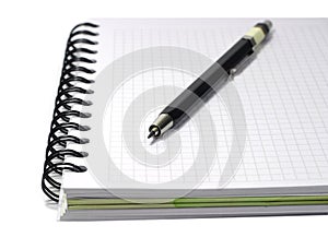 Notebook with mecanical pencil isolated on white