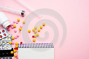 notebook medicine medicines pharmaceutical painkillers pink background