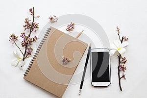 Notebook ,mobile phone of student writing note for study