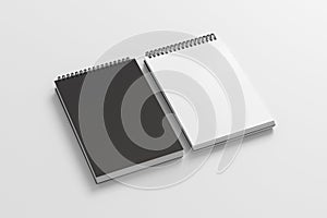 Notebook mockup. Closed and open blank notebook with black cover. Spiral notepad on white background