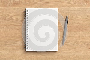 Notebook mockup. Opened blank notebook and pen. Spiral notepad on gray background