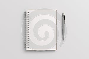 Notebook mockup. Opened blank notebook and pen. Spiral notepad on white background