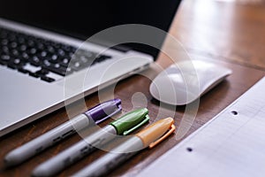 Notebook with a mouse on a table