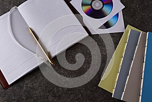 Notebook, notebooks and CDs
