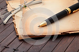 Notebook old papers and pen.