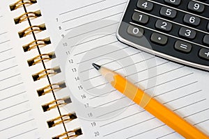 Notebook (organizer), pencil and calculator