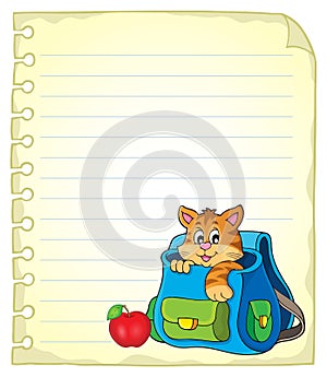 Notebook page with cat in schoolbag photo
