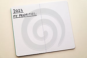 Notebook page, with text ` 2023 priorities`. photo