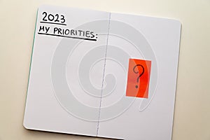 Notebook page, with text ` 2023 priorities`. photo