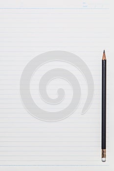 Notebook paper background with pencil