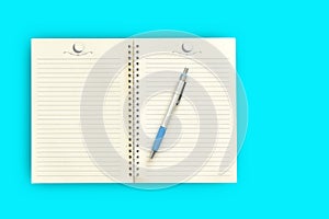Notebook,pen on a blue background