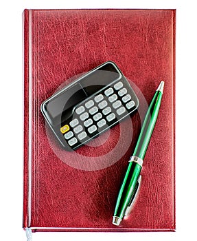 Notebook, pen and calculator from above