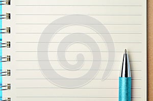 Notebook with pen on closeup