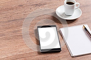 Notebook with pen, smart phone and coffee cup