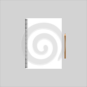 Notebook and pencil with copy space isolated on background.
