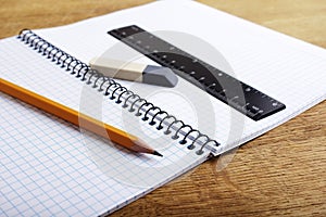 Notebook with pencil and eraser