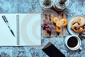 Notebook placed on the dining table.