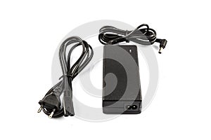 Notebook power AC / DC adapter isolated on white background