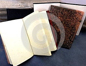 Notebook of recycled paper bound in leather