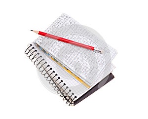 Notebook with red pencil