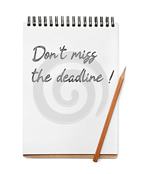Notebook with reminder Don\'t Miss The Deadline and pencil on white background, top view