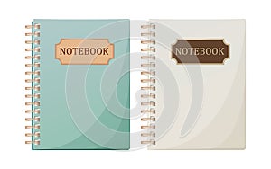 Notebook on rings for notes with an inscription in green and white. Vector illustration.