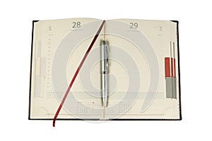 Notebook and silver ballpen