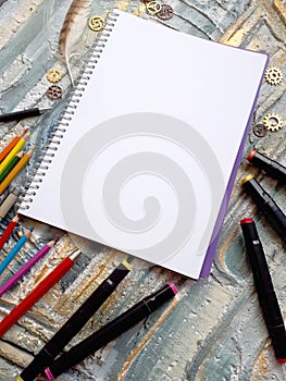 Notebook for the sketch on a colourful background