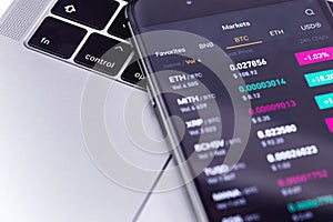 Notebook, smartphone with cryptocurrency stock market