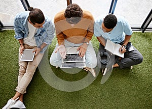 Notebook, tablet and laptop business men in a creative startup office brainstorming idea online. Planning, strategy and