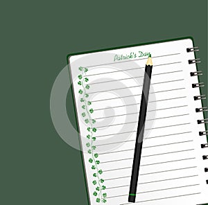 Notebook with template hand-drawn Green festive bunting with clover and pencil. Irish holiday - Happy St. Patrick`s Day with a