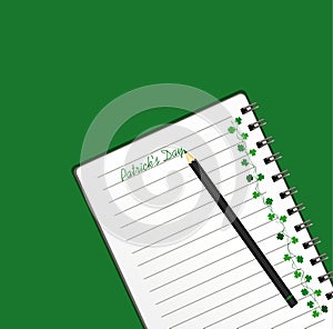 Notebook with template hand-drawn Green festive bunting with clover and pencil. Irish holiday - Happy St. Patrick`s Day with a